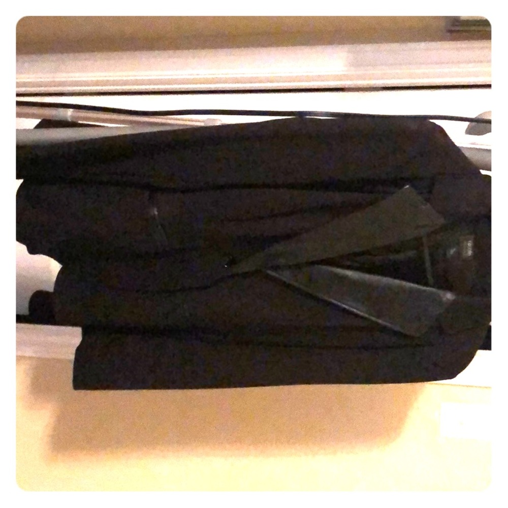 Nicole Miller black blazer with leather trim.